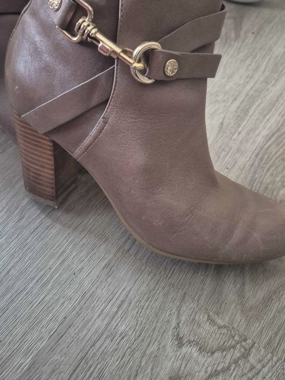 Women's Isola leather heeled booties size 8 in taupe, Gold Accent